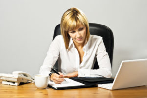Beautiful Business Lady at Desk