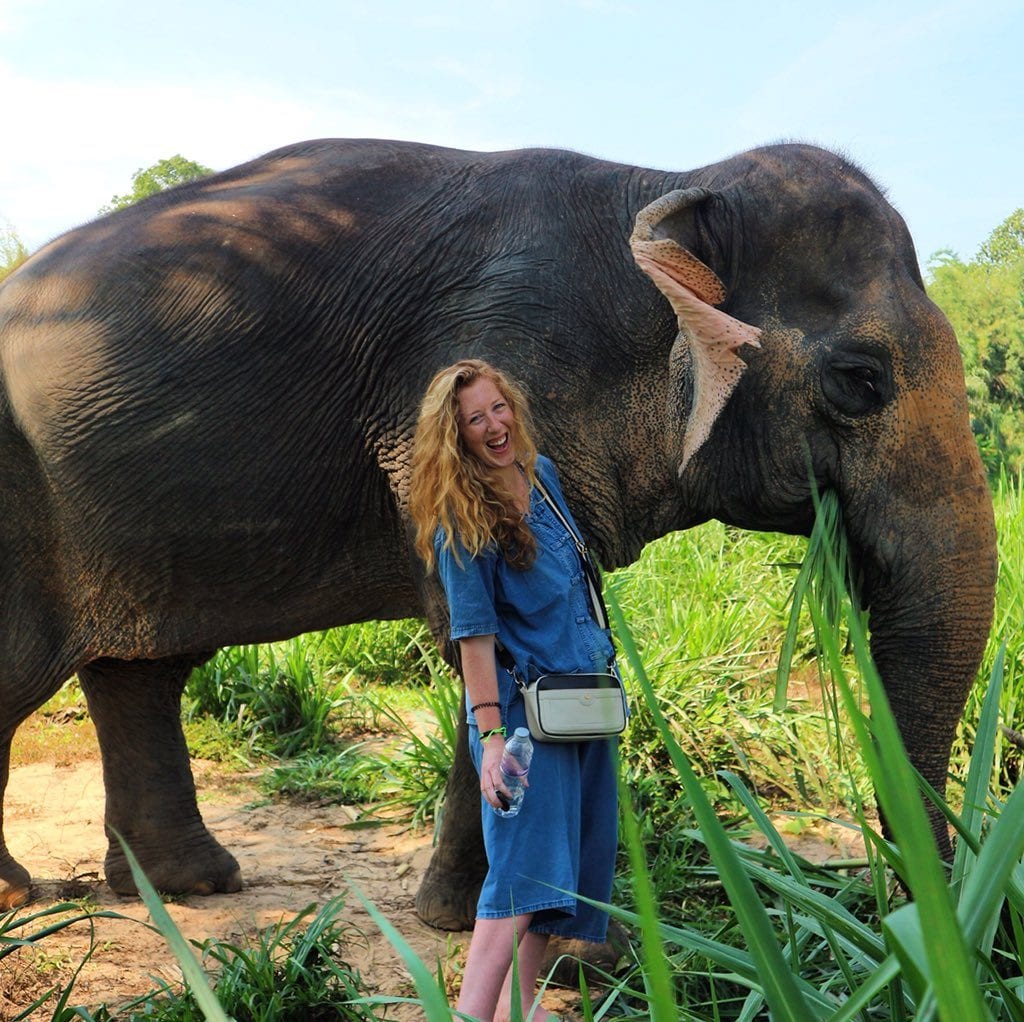 Travel writer Candice Walsh getting close to the wildlife in Southeast Asia